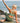 woman in styliral light and cozy fabricssh activewear 